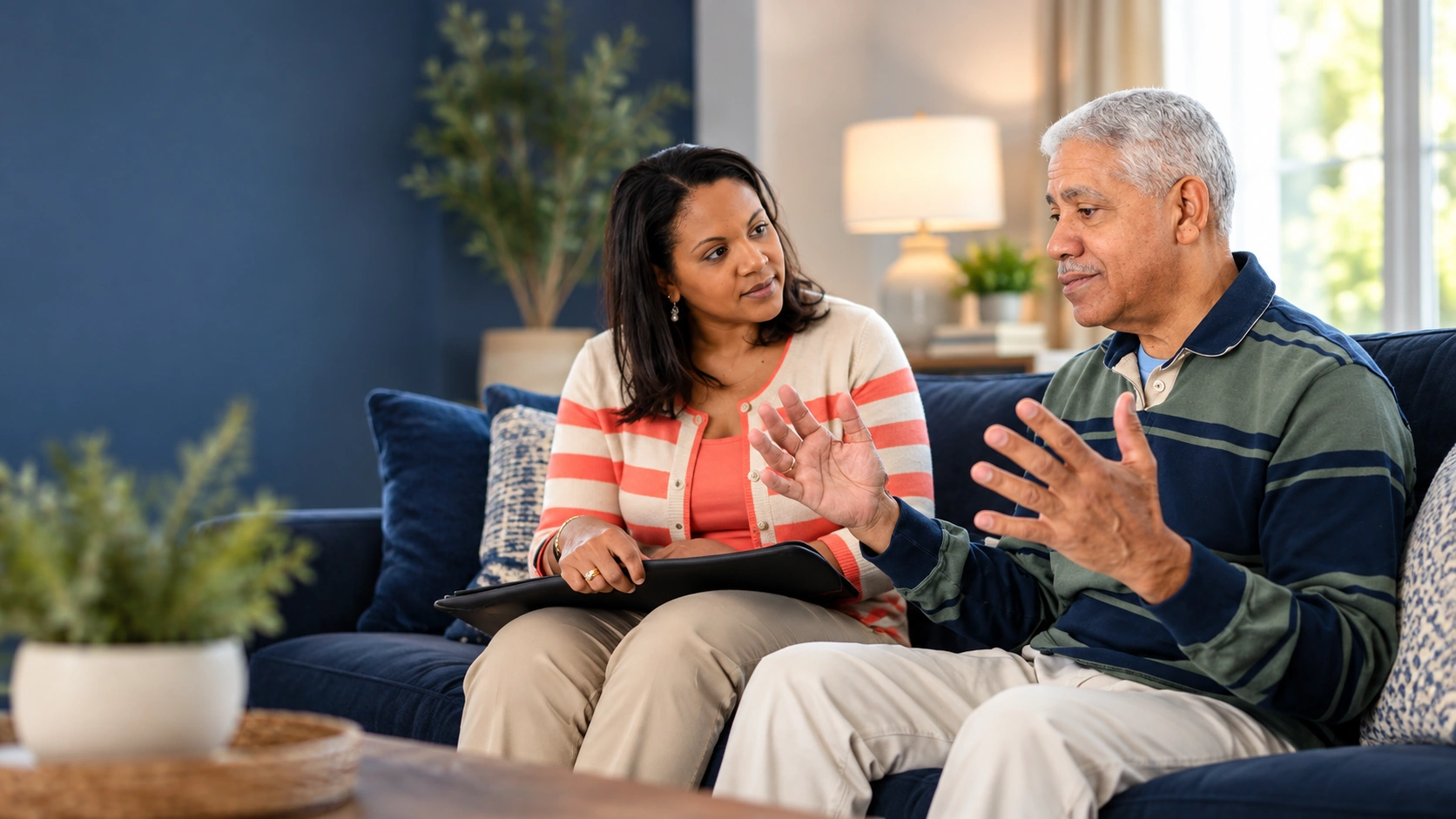 An older man in conversation with a companion